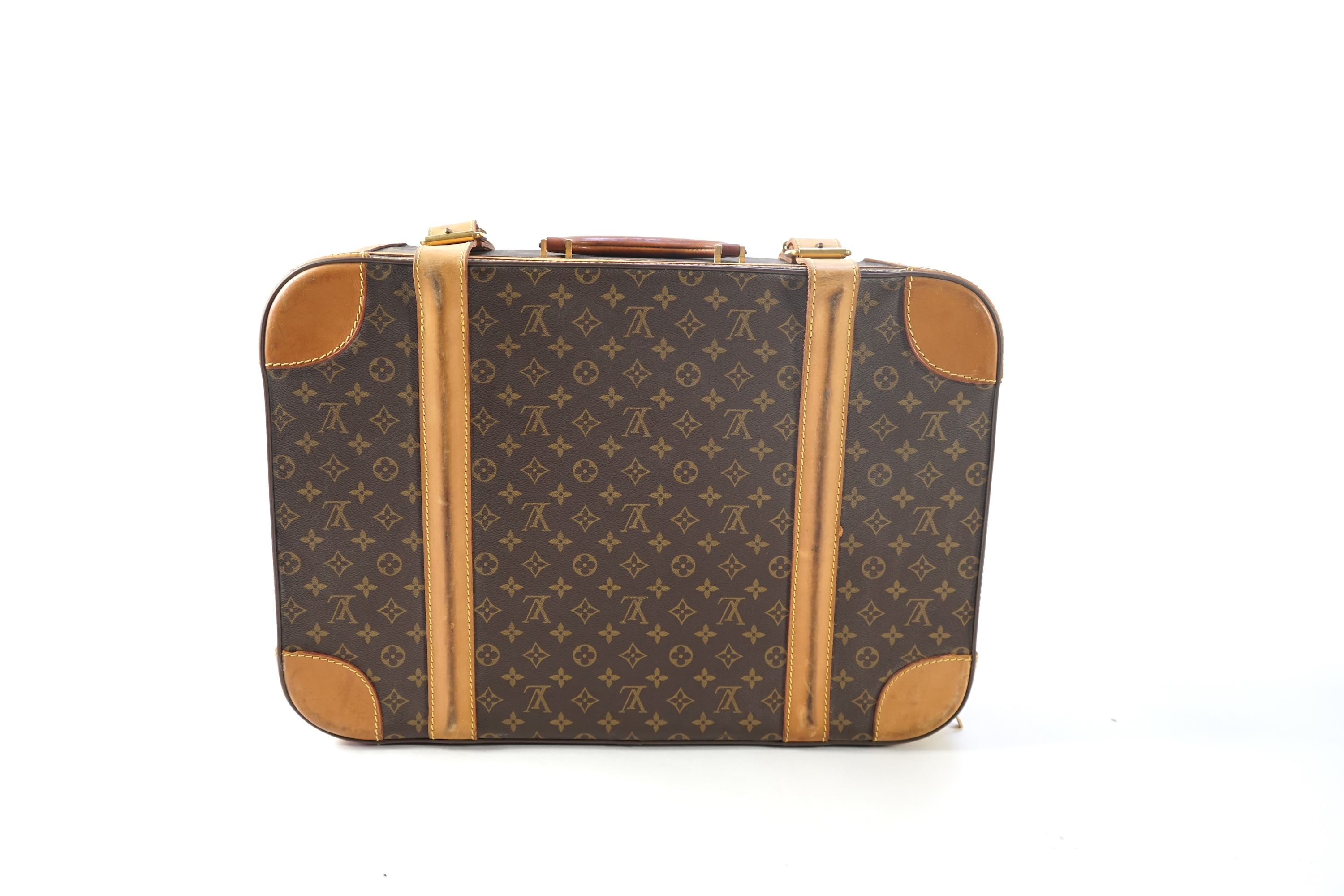 A Louis Vuitton monogrammed canvas with leather trim soft sided suitcase